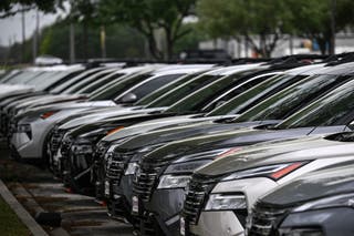Trump tariffs live: 10% tariff kicks in for UK after terrible day for global stocks Cars are for sale at a Nissan dealership in Katy, Texas, on April 2, 2025.